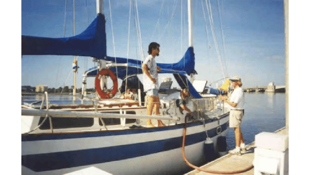 Young Tain on sailboat